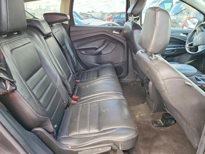 Photo 10 from auction – 2018 FORD ESCAPE with VIN 1FMCU9J95JUD34890