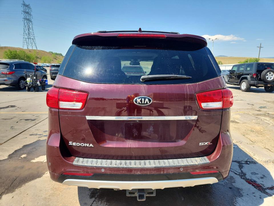Photo 6 from auction – 2015 KIA SEDONA with VIN KNDME5C18F6033161