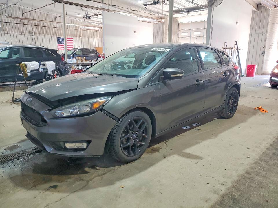 FORD FOCUS 2016 with VIN 1FADP3K28GL299572 - Photo from auction