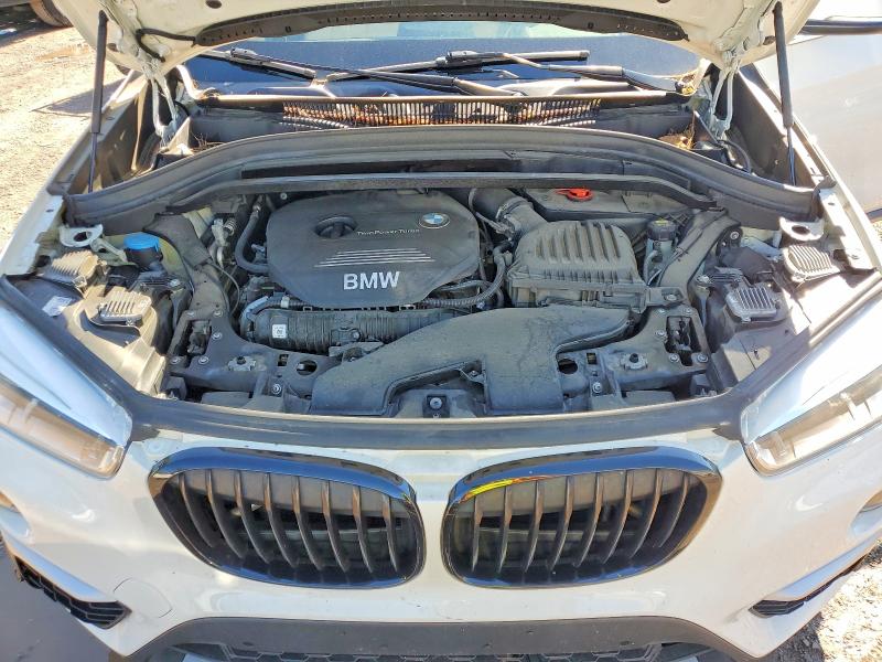 Photo 11 from auction – 2017 BMW X1 with VIN WBXHT3C31H5F71132