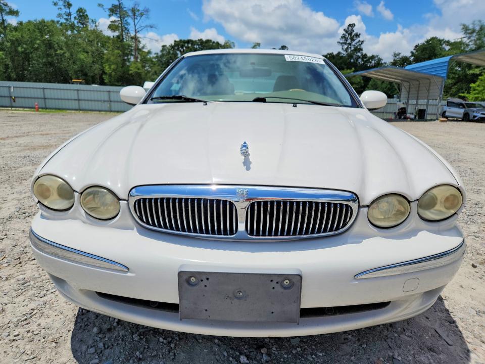 Photo 5 from auction – 2004 JAGUAR X-TYPE with VIN SAJEA51C84WD77899