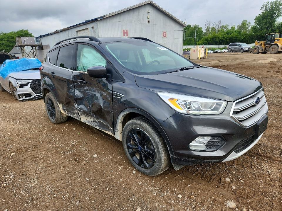 Photo 4 from auction – 2019 FORD ESCAPE with VIN 1FMCU9HD9KUA80080