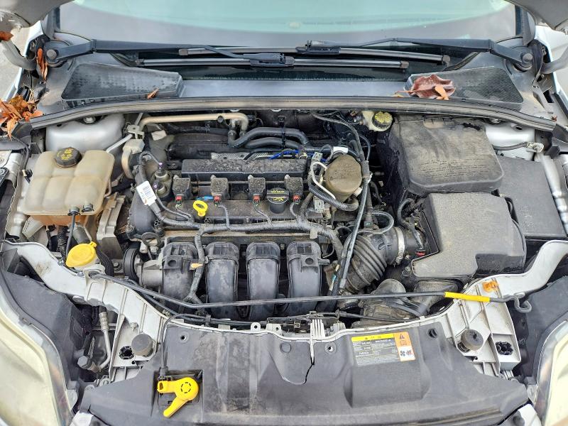 Photo 11 from auction – 2014 FORD FOCUS with VIN 1FADP3F23EL142118