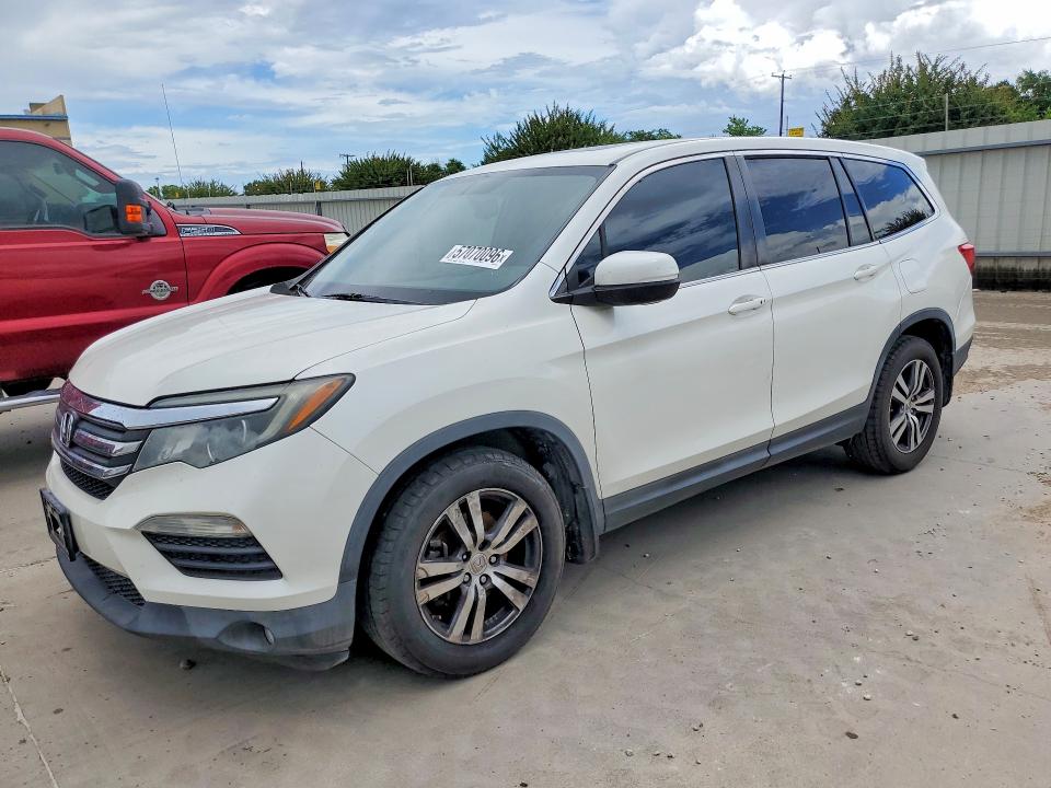 HONDA PILOT 2017 with VIN 5FNYF5H59HB010702 - Photo from auction