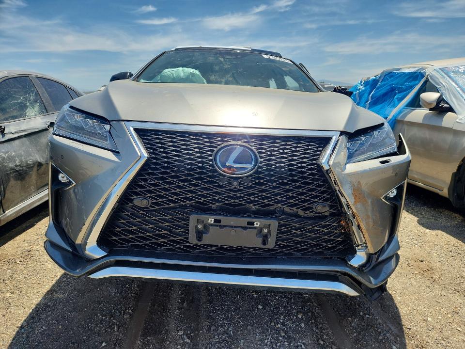Photo 5 from auction – 2019 LEXUS RX 450H with VIN 2T2BGMCA0KC042012