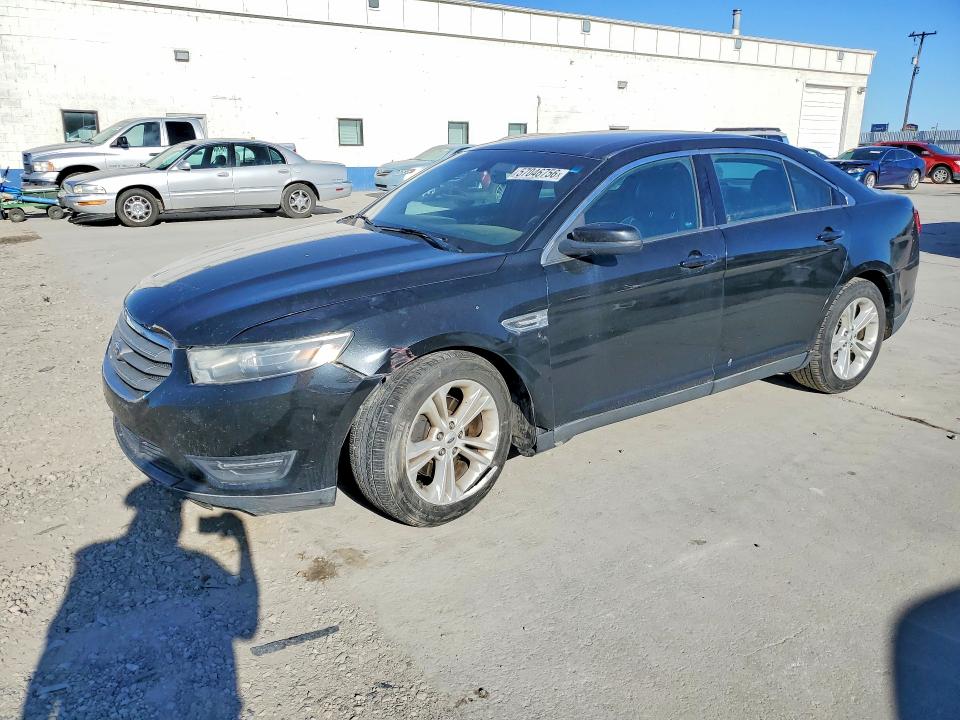FORD TAURUS 2015 with VIN 1FAHP2E91FG154756 - Photo from auction