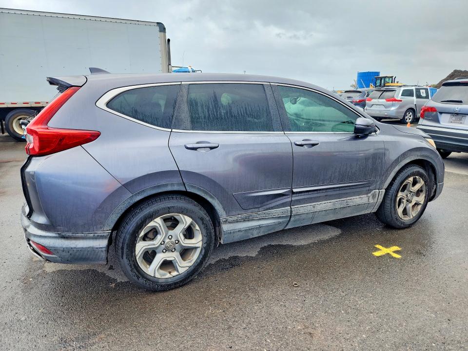 Photo 3 from auction – 2017 HONDA CR-V with VIN 2HKRW1H89HH507905