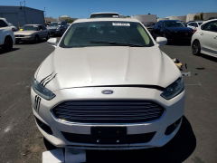 Photo 5 from auction – 2016 FORD FUSION with VIN 3FA6P0PU0GR106690