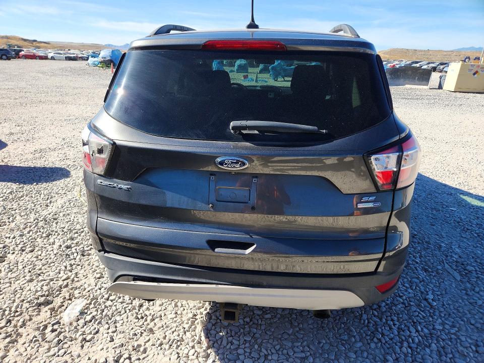 Photo 6 from auction – 2018 FORD ESCAPE with VIN 1FMCU9GD3JUA99479