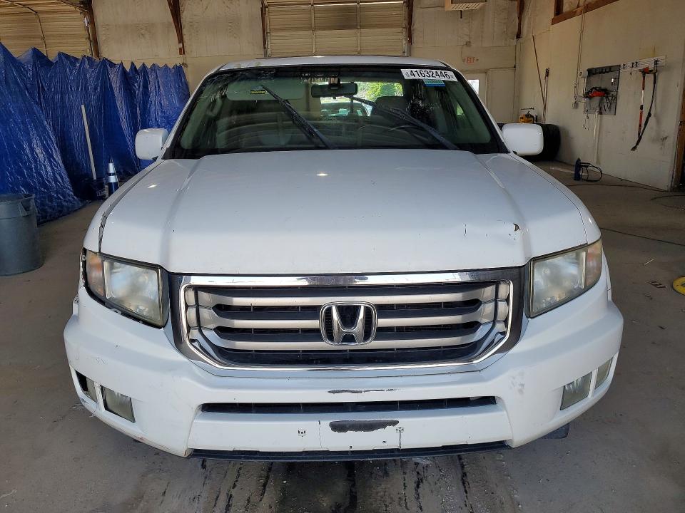 Photo 5 from auction – 2012 HONDA RIDGELINE with VIN 5FPYK1F57CB452854
