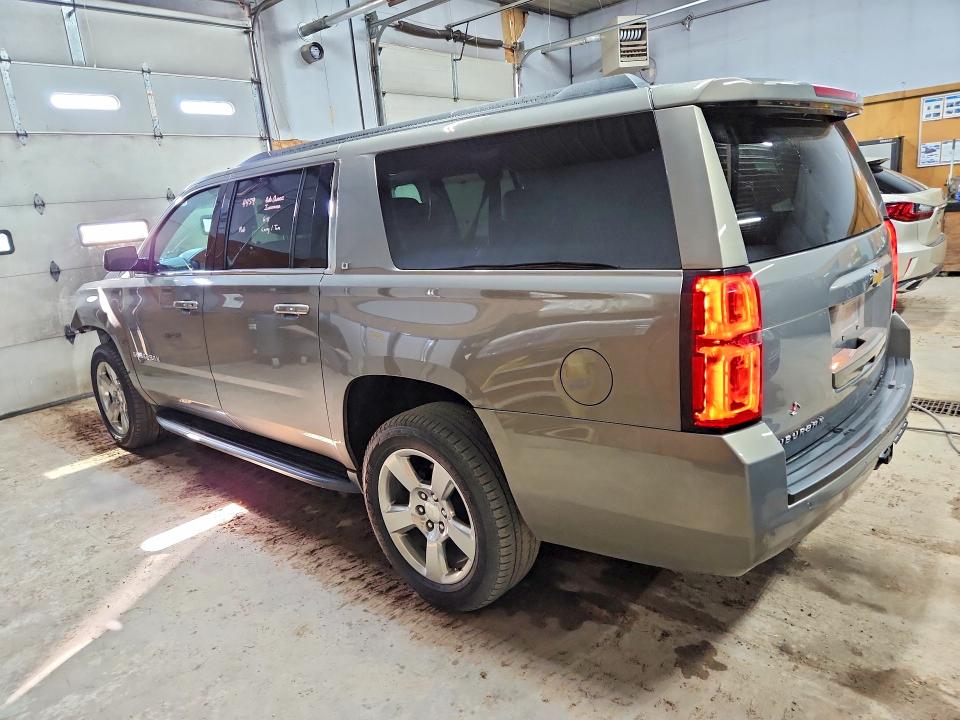 Photo 2 from auction – 2019 CHEVROLET SUBURBAN with VIN 1GNSKHKC8KR261097