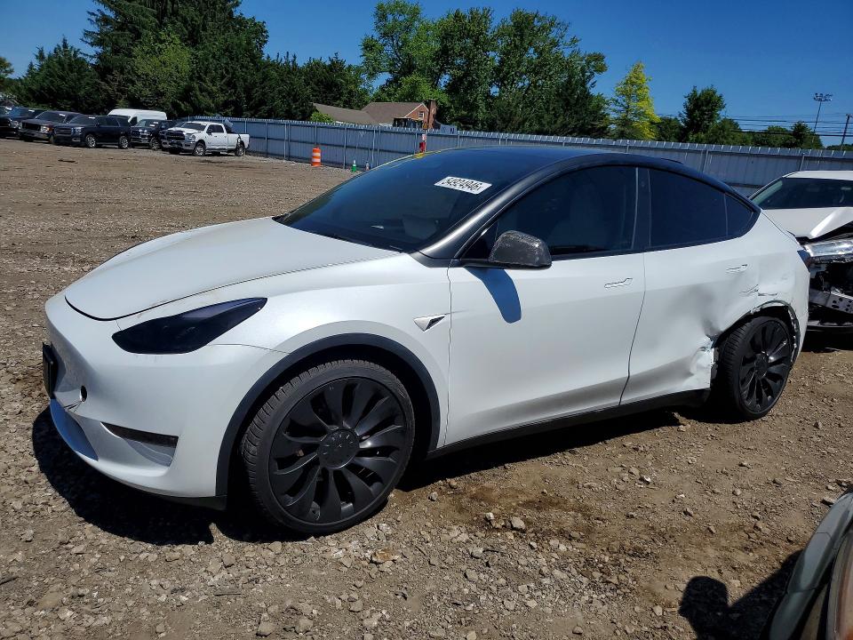 TESLA MODEL Y 2023 с VIN 7SAYGDEF8PF777057 - Фото с аукциона