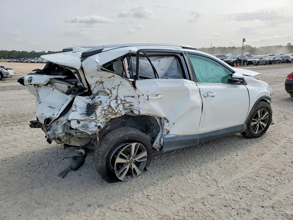 Photo 3 from auction – 2018 TOYOTA RAV4 with VIN 2T3WFREV9JW412139