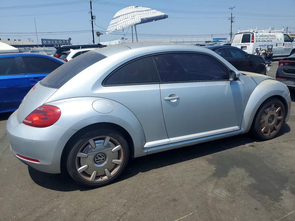 Photo 3 from auction – 2012 VOLKSWAGEN BEETLE with VIN 3VWJP7AT8CM661324