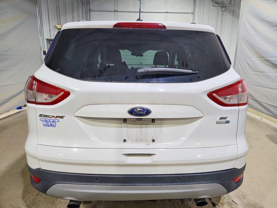 Photo 6 from auction – 2015 FORD ESCAPE with VIN 1FMCU9GX4FUB99785