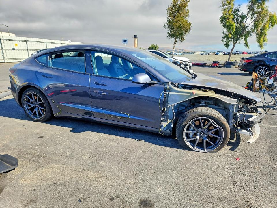 Photo 4 from auction – 2022 TESLA MODEL 3 with VIN 5YJ3E1EA2NF168107