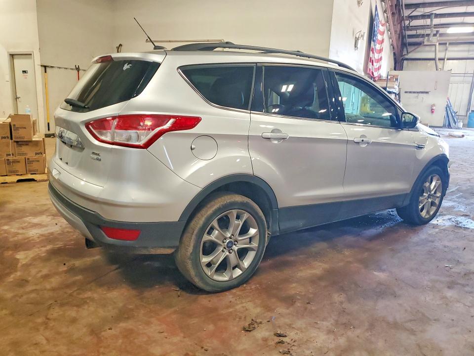Photo 3 from auction – 2013 FORD ESCAPE with VIN 1FMCU9H94DUB62961