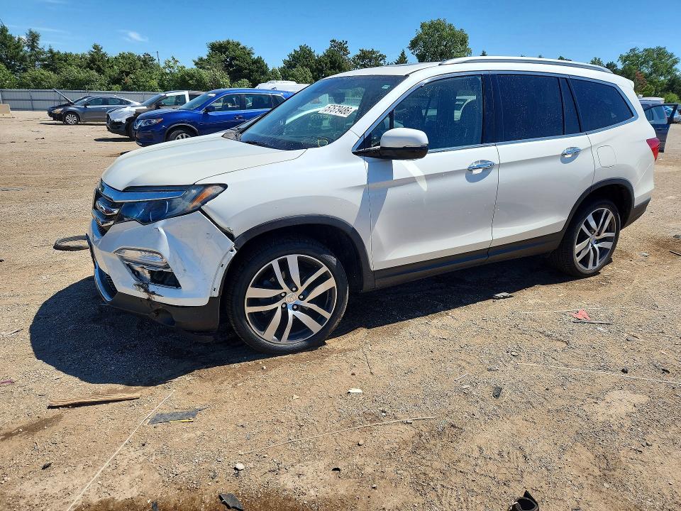 HONDA PILOT 2018 with VIN 5FNYF6H99JB036201 - Photo from auction