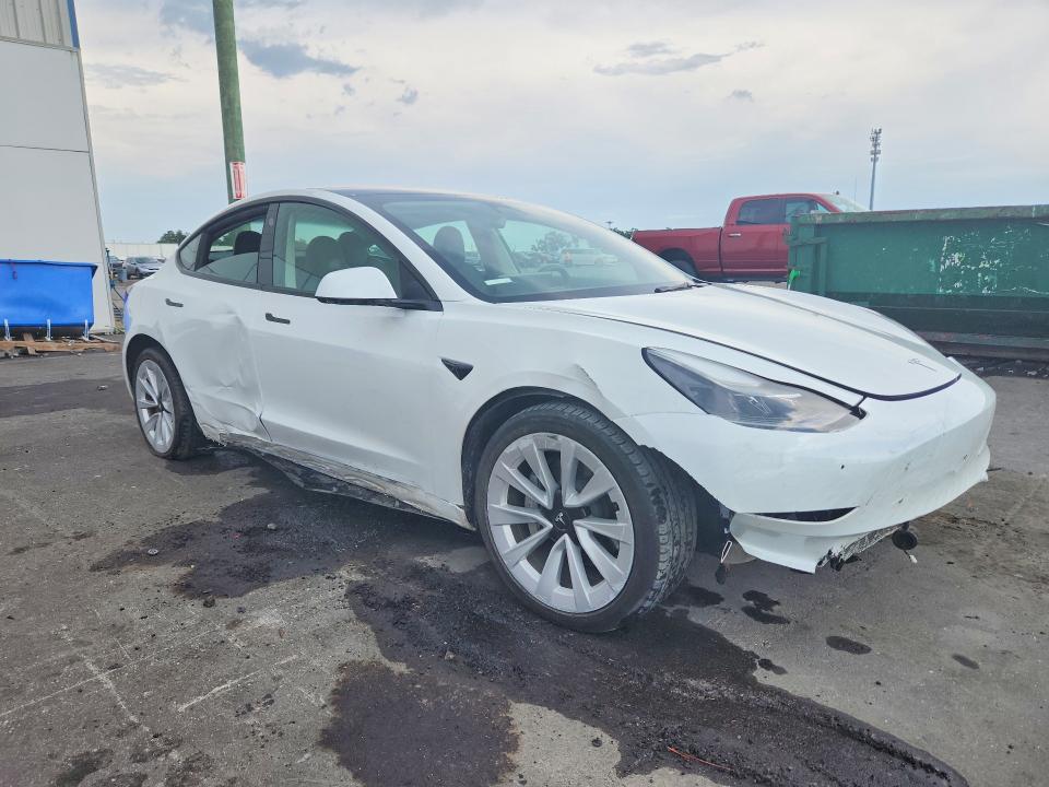 Photo 4 from auction – 2023 TESLA MODEL 3 with VIN 5YJ3E1EA5PF494955