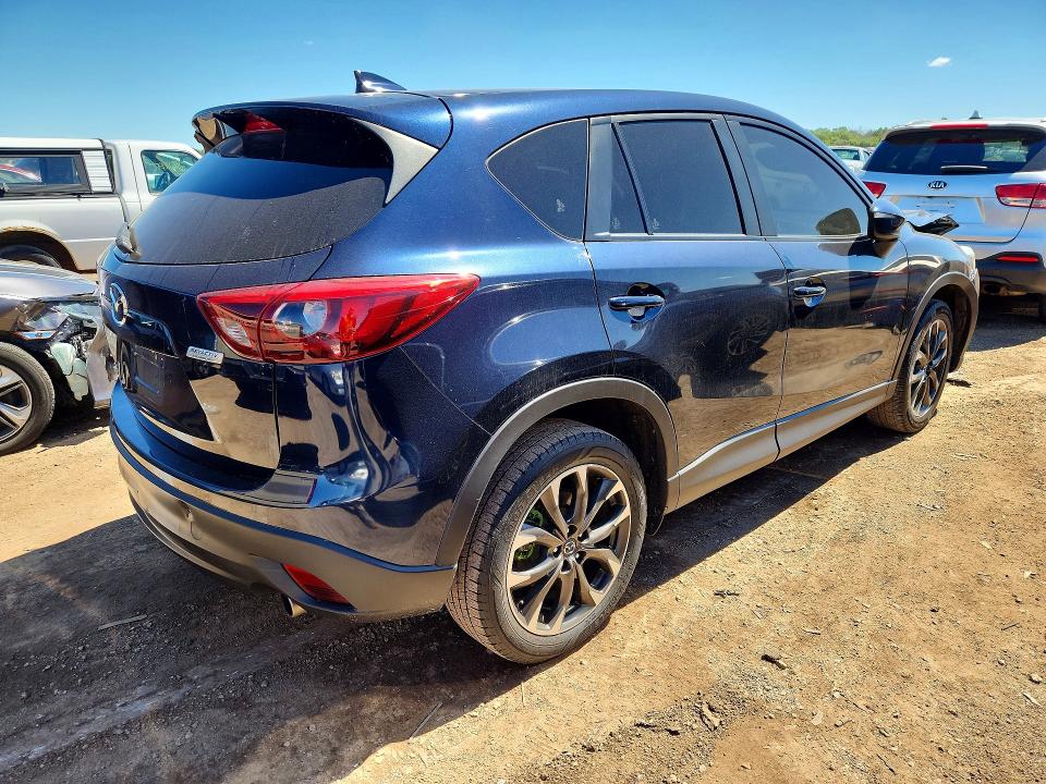 Снимка 3 от търг – 2016 MAZDA CX-5 с VIN JM3KE4DY5G0702916