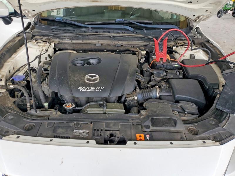Photo 11 from auction – 2015 MAZDA 3 with VIN 3MZBM1V77FM169024