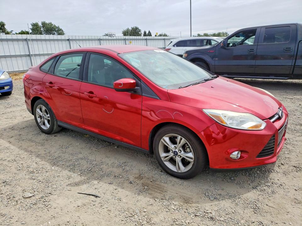 Photo 4 from auction – 2012 FORD FOCUS with VIN 1FAHP3F21CL386526