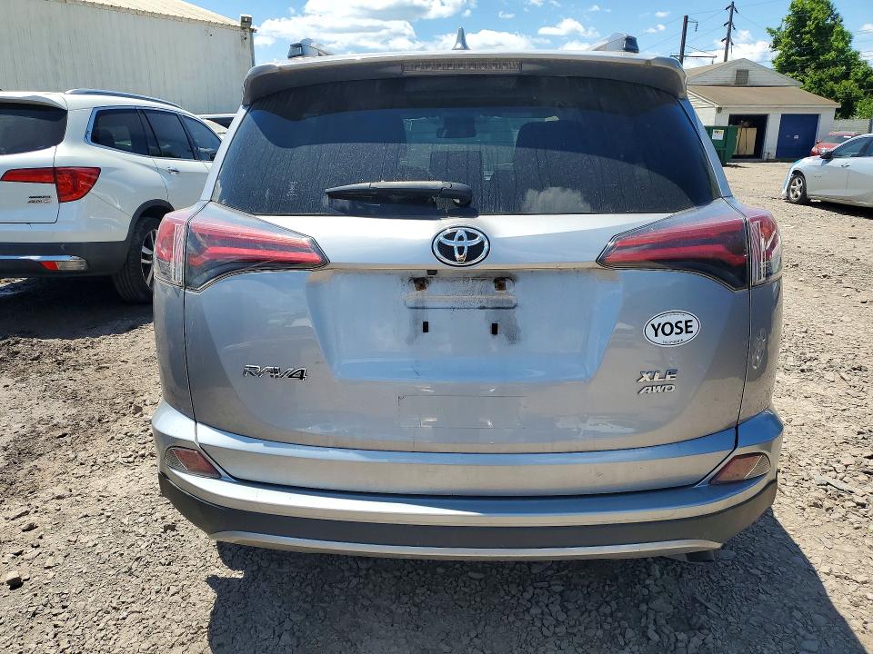 Photo 6 from auction – 2018 TOYOTA RAV4 with VIN JTMRFREV2JD254110