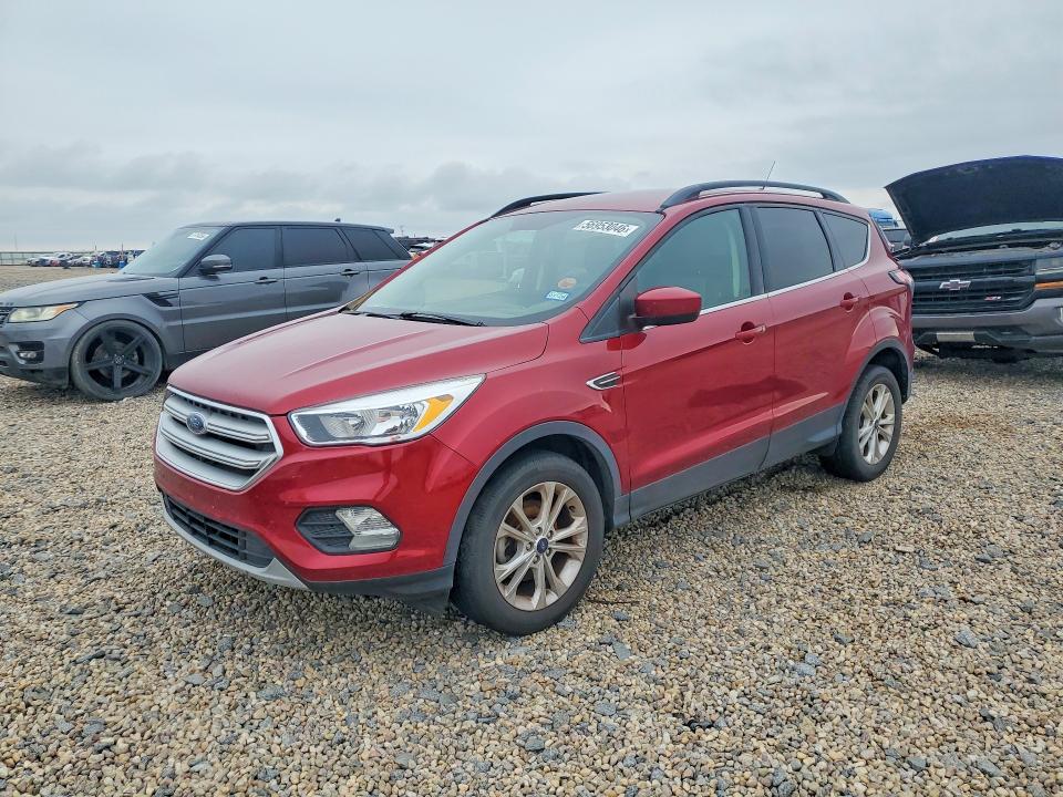 FORD ESCAPE 2018 with VIN 1FMCU0GD6JUD03199 - Photo from auction