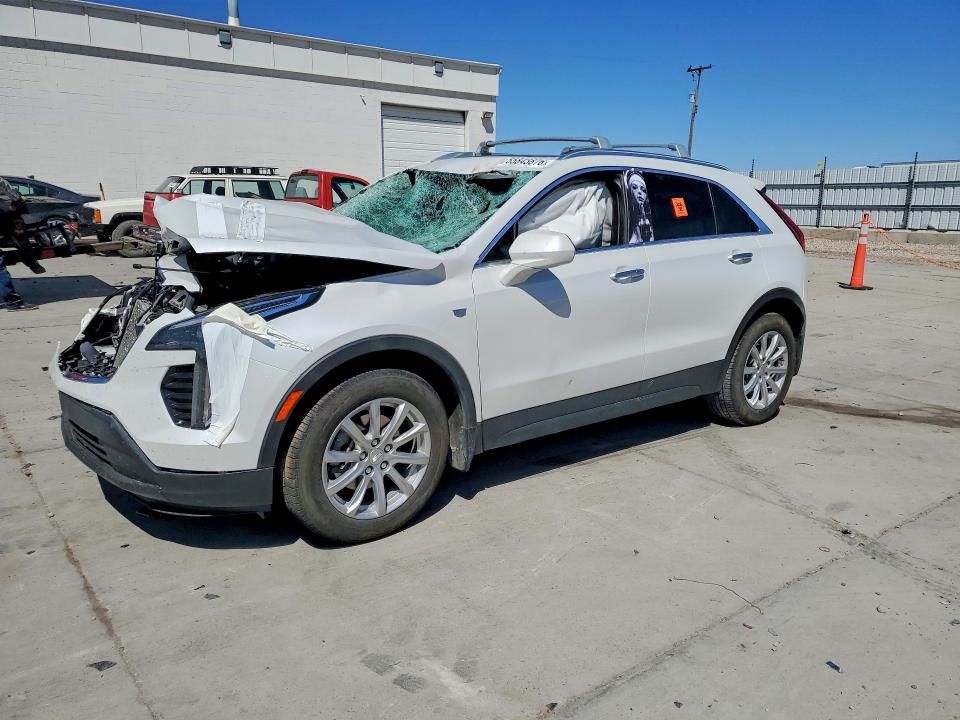 CADILLAC XT4 2022 with VIN 1GYFZBR40NF128304 - Photo from auction