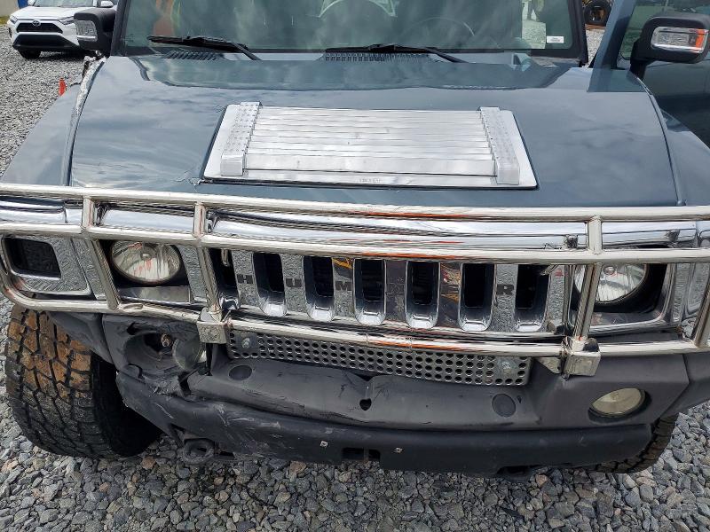 Photo 11 from auction – 2006 HUMMER H2 with VIN 5GRGN23U16H102460