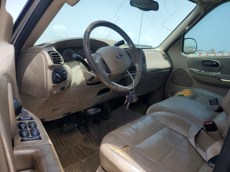 Photo 8 from auction – 2003 FORD F-150 with VIN 1FTRW08L73KD56670
