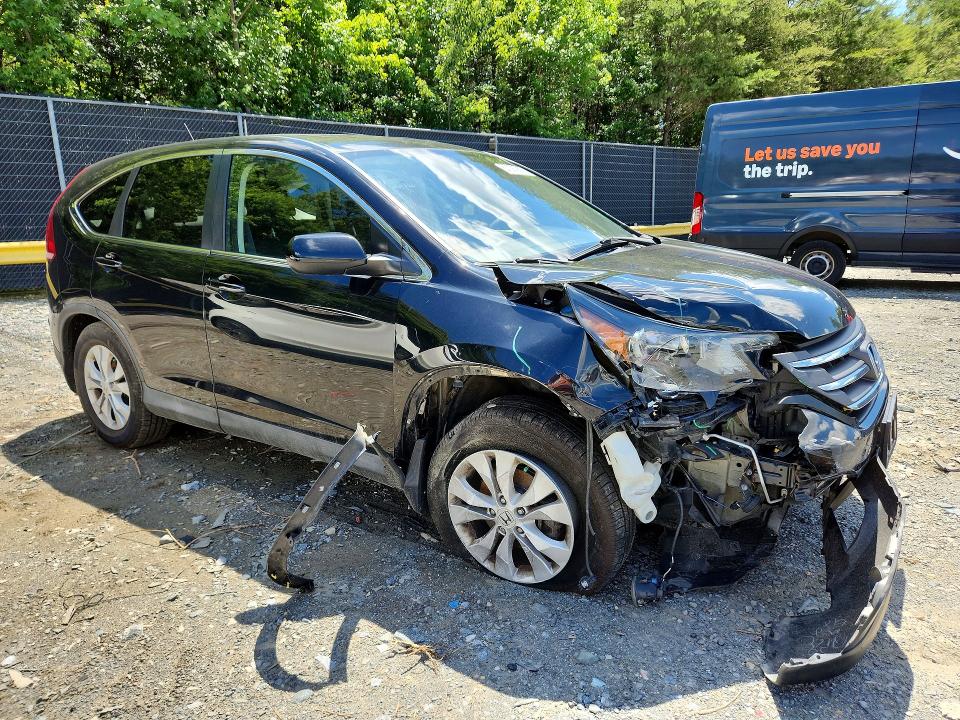 Photo 4 from auction – 2014 HONDA CR-V with VIN 2HKRM4H56EH656152