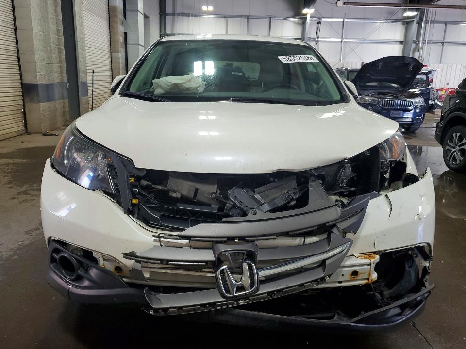Photo 5 from auction – 2014 HONDA CR-V with VIN 5J6RM4H58EL027319