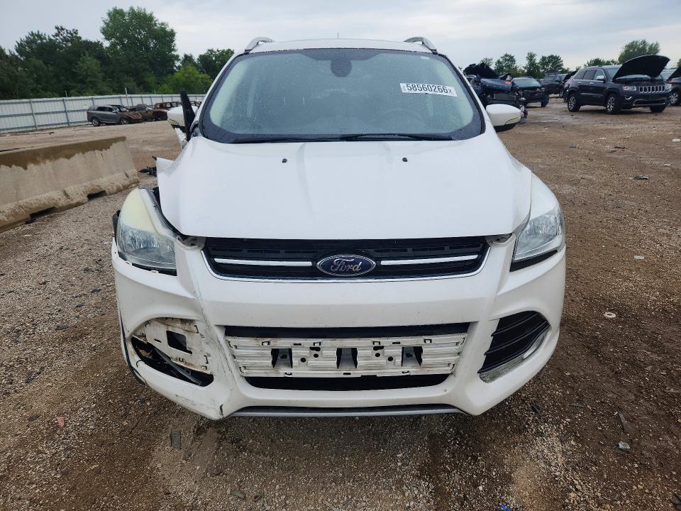 Photo 5 from auction – 2016 FORD ESCAPE with VIN 1FMCU0JX0GUB12454