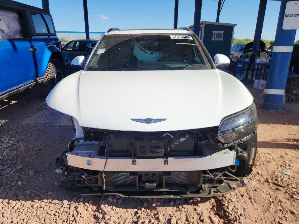 Photo 5 from auction – 2023 GENESIS GV60 with VIN KMUKCDTC1PU014065