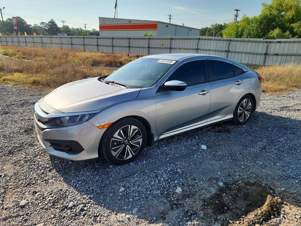 HONDA CIVIC 2018 with VIN JHMFC1F76JX029862 - Photo from auction