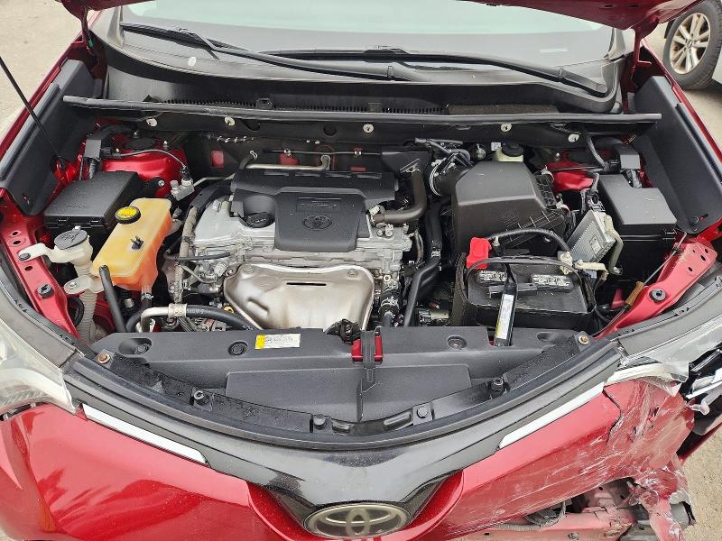 Photo 11 from auction – 2018 TOYOTA RAV4 with VIN 2T3ZFREV2JW494549