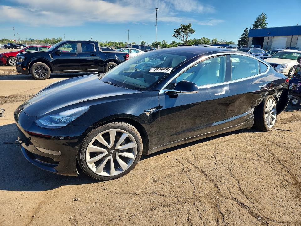 TESLA MODEL 3 2018 with VIN 5YJ3E1EB0JF135058 - Photo from auction