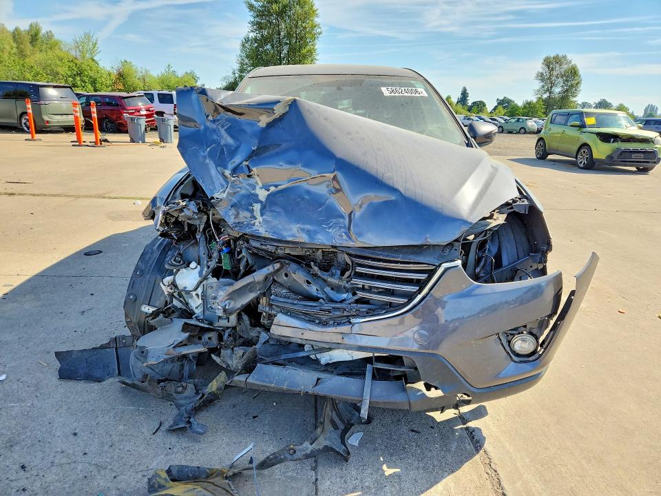 Photo 5 from auction – 2016 MAZDA CX-5 with VIN JM3KE4CY2G0842018