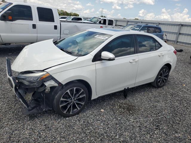 TOYOTA COROLLA 2018 with VIN 5YFBURHE3JP789043 - Photo from auction