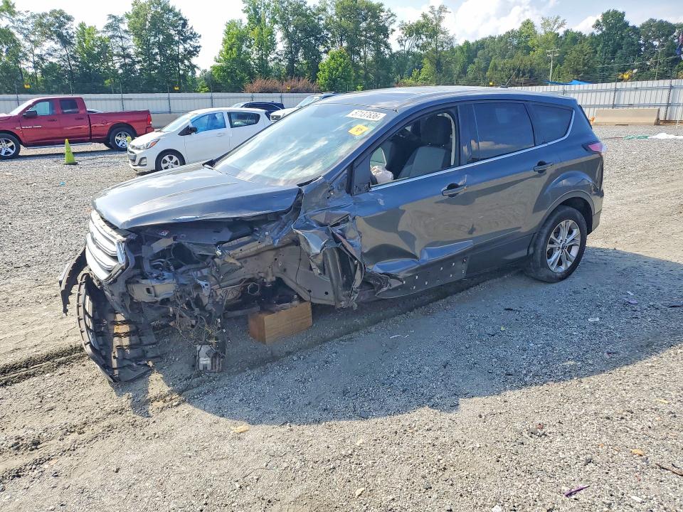 FORD ESCAPE 2017 with VIN 1FMCU9G98HUD44802 - Photo from auction