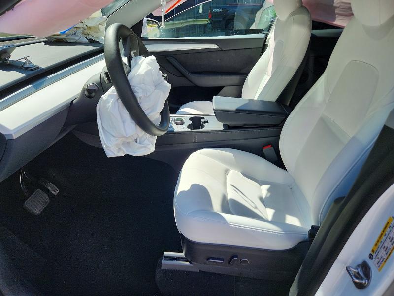 Photo 7 from auction – 2023 TESLA MODEL Y with VIN 7SAYGDEE6PF672573