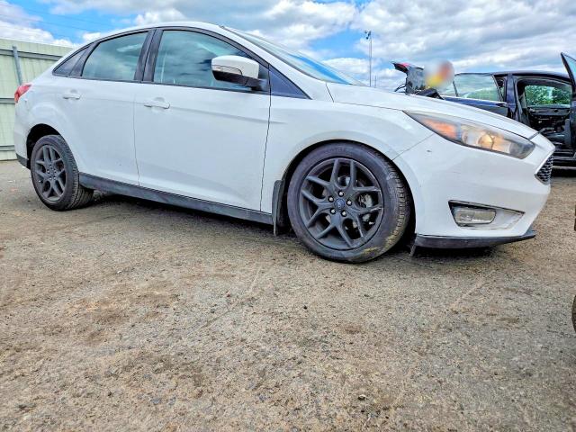 Photo 4 from auction – 2016 FORD FOCUS with VIN 1FADP3F21GL209382