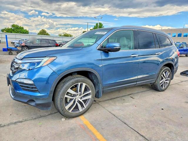 HONDA PILOT 2017 with VIN 5FNYF6H92HB065887 - Photo from auction