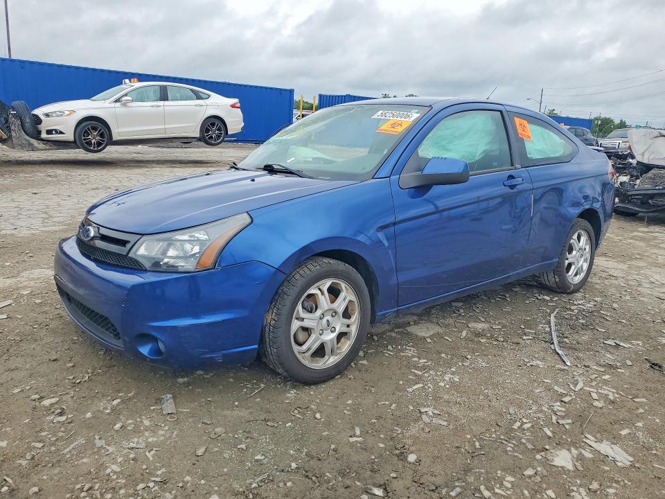FORD FOCUS 2009 with VIN 1FAHP32NX9W212381 - Photo from auction