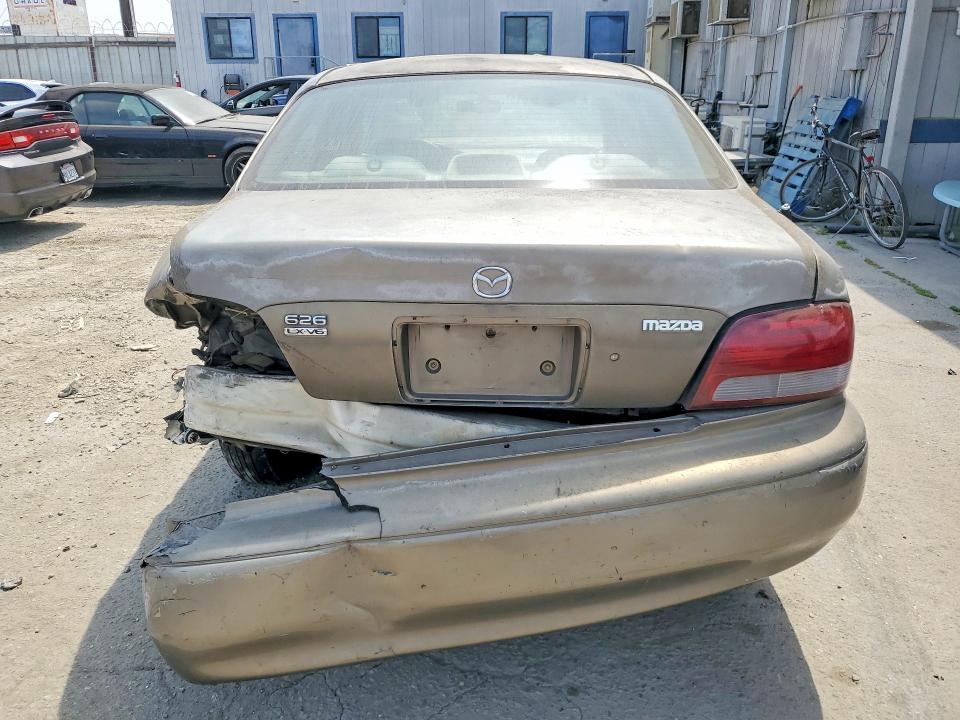 Photo 6 from auction – 1999 MAZDA 626 with VIN 1YVGF22D3X5822551
