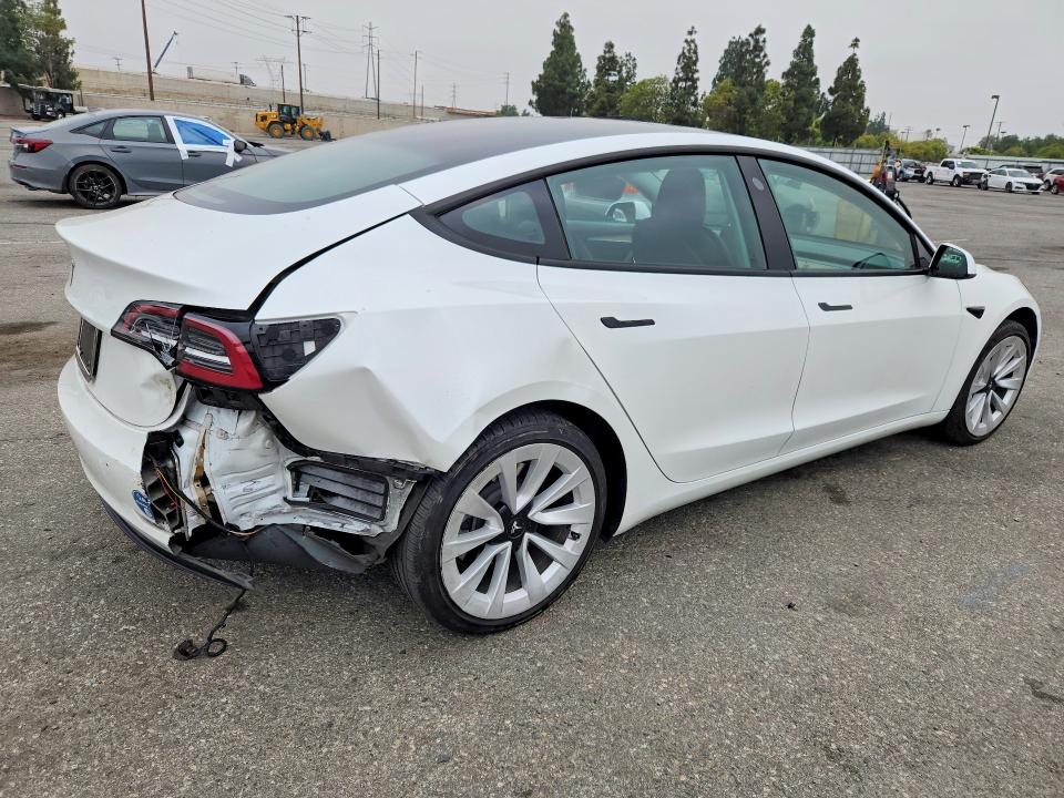 Photo 3 from auction – 2021 TESLA MODEL 3 with VIN 5YJ3E1EA1MF977855