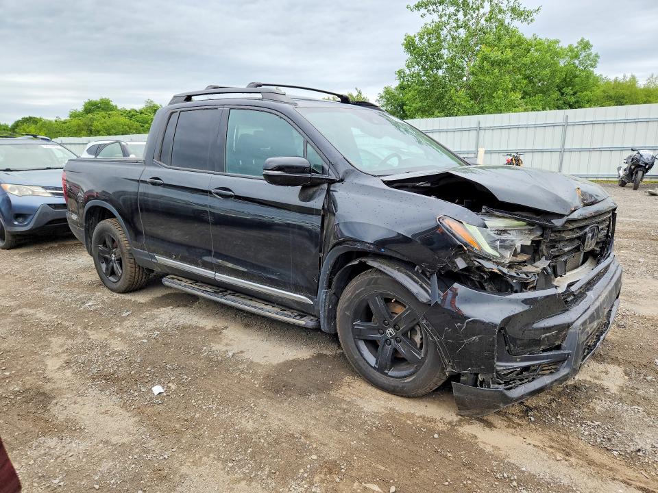 Photo 4 from auction – 2022 HONDA RIDGELINE with VIN 5FPYK3F83NB036146