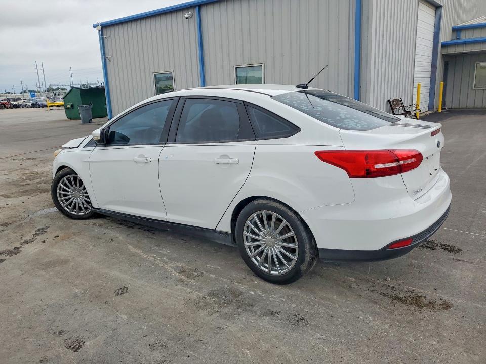 Photo 2 from auction – 2015 FORD FOCUS with VIN 1FADP3F22FL354428