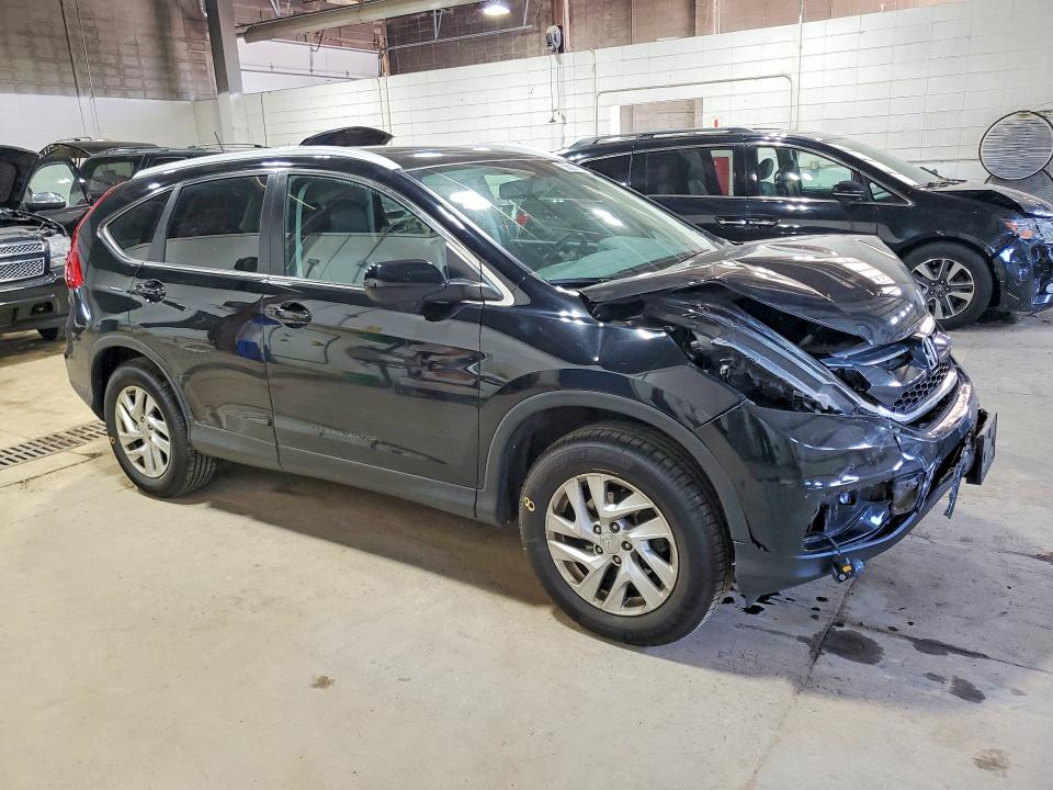 Photo 4 from auction – 2016 HONDA CR-V with VIN 5J6RM4H71GL116122